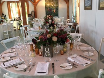 Round tables for barn dinner reception